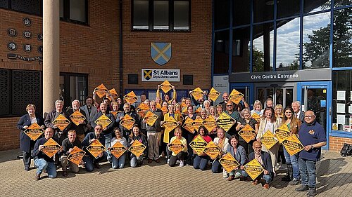 Liberal Democrats outside the council building 